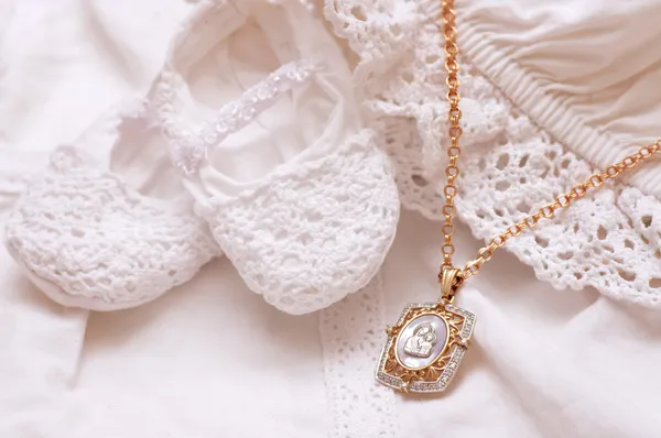 Baby shoes and white dress   for Christening — Stock Photo, Image