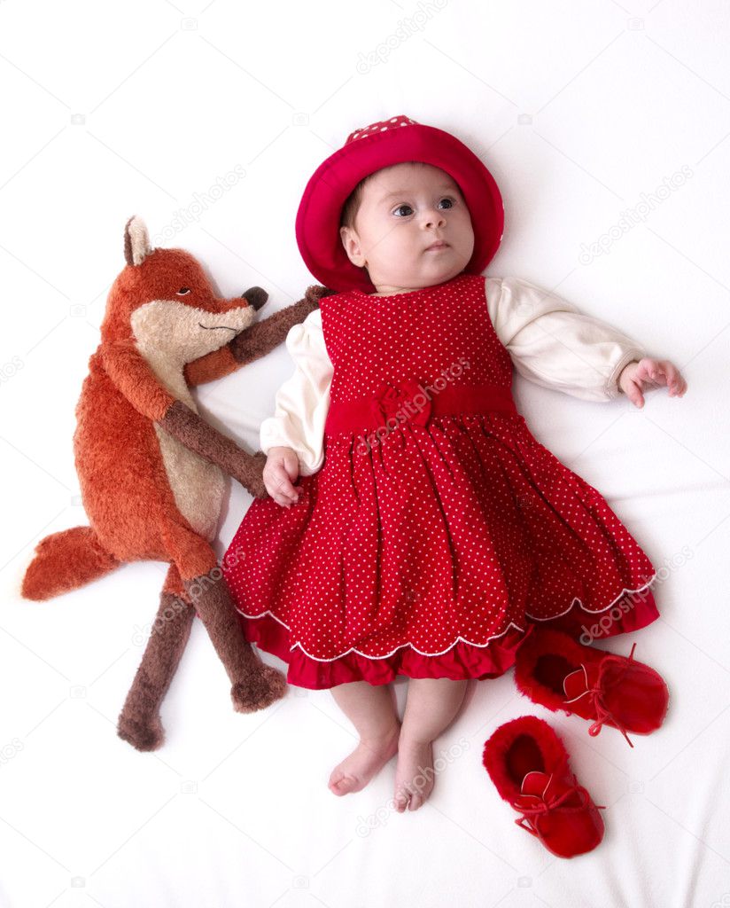 Beautiful baby girl in red dress — Stock Photo © Forewer 42161573