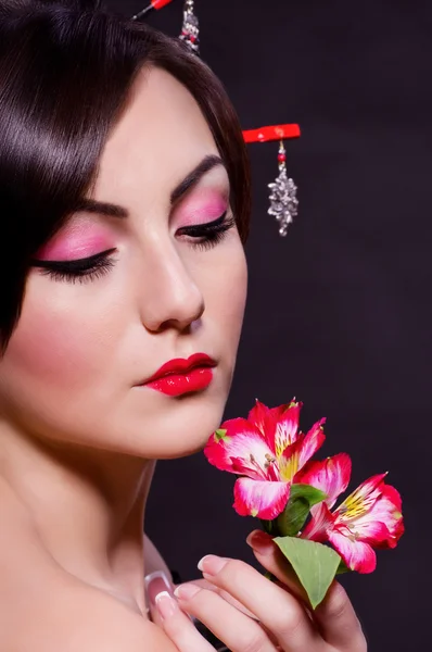 Young woman in Asian costume — Stock Photo, Image