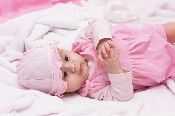 Baby girl in pink hat — Stock Photo, Image
