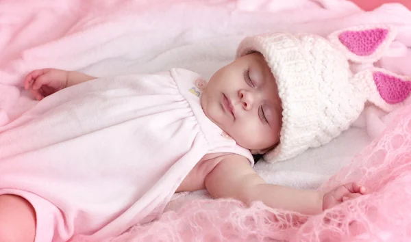 Baby girl in pink hat — Stock Photo, Image