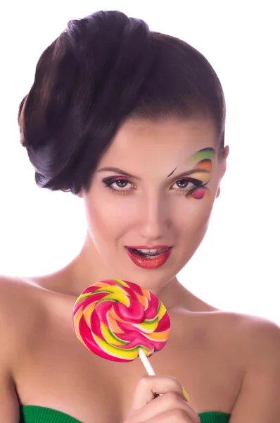 Girl with spiral lollipop — Stock Photo, Image