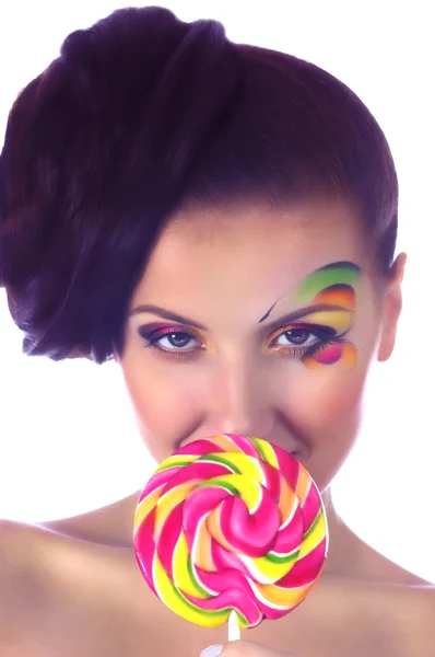 Girl with spiral lollipop — Stock Photo, Image