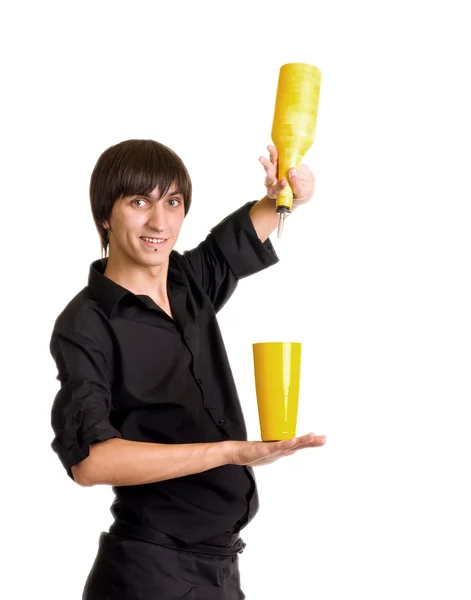 Bartender med en shaker och flaska — Stockfoto