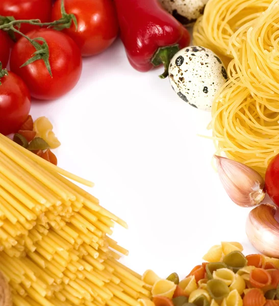 Italian raw pasta with tomatoes, cheese and spices — Stock Photo, Image