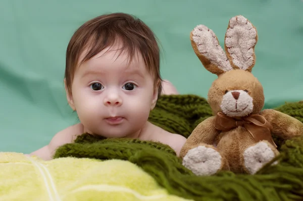 Cute little girl with plush bunny — Stock Photo, Image