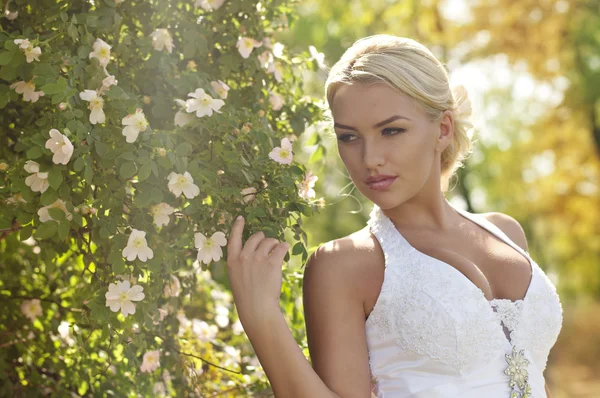 Bride with make-up in white dress — Stock Photo, Image