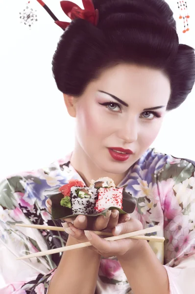 Mulher com sushi — Fotografia de Stock