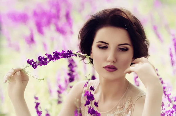 Woman in spring garden — Stock Photo, Image