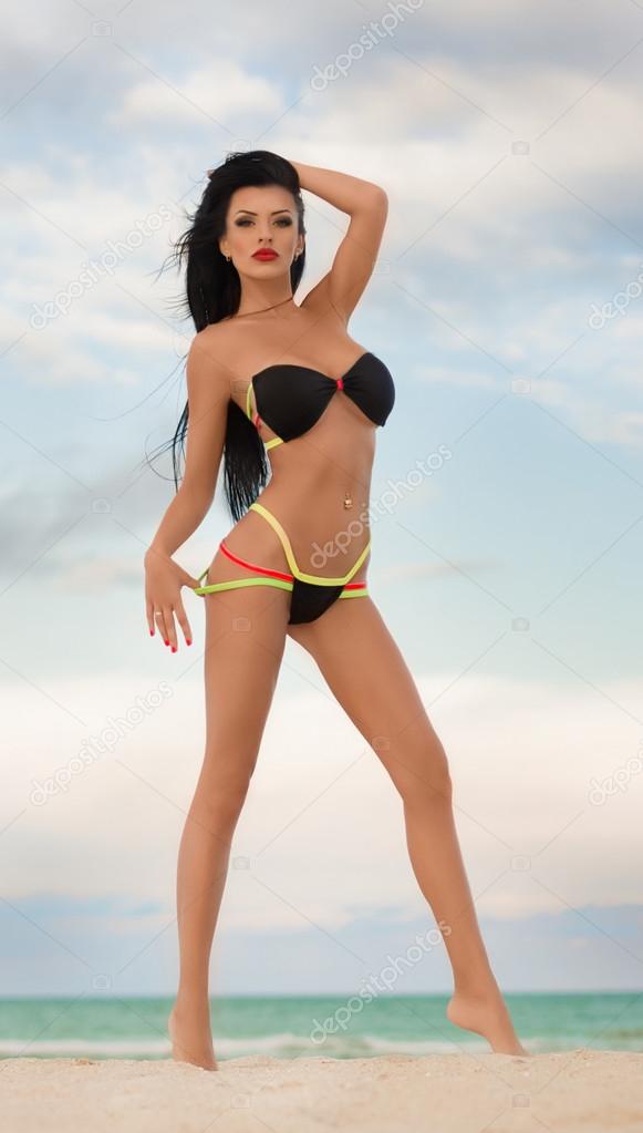 Bikini girl posing at beach