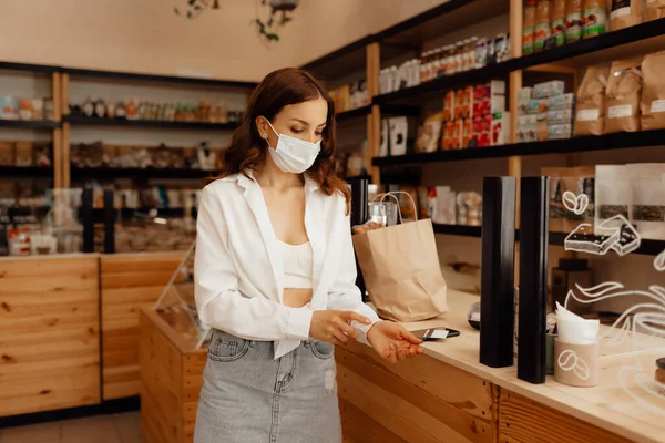 Girl Buyer Mask Makes Purchase Store Saleswoman Small Business Owner — 스톡 사진