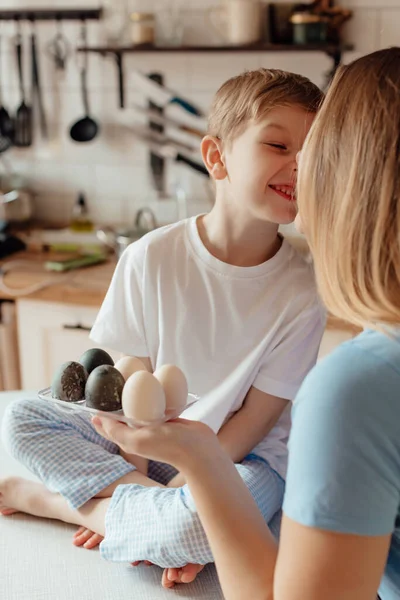 Happy Family Preparing Easter Eggs Indoors Mother Boy Celebrating Happy — Stock Photo, Image