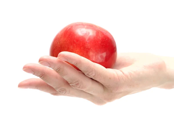 Apple at the woman hand 2 — Stock Photo, Image