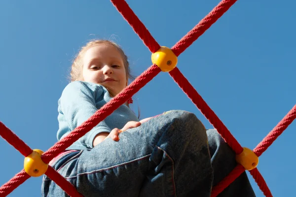 Menina no parque infantil — Fotografia de Stock