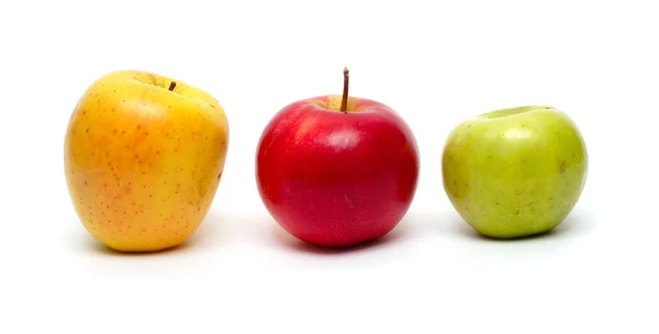 Drie veelkleurige appels in een rij — Stockfoto