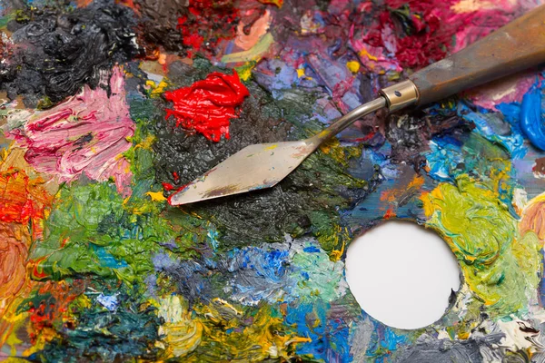 Pallette with brushes — Stock Photo, Image