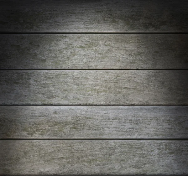 Verwittertes graues horizontales Holz dramatisch angezündet — Stockfoto