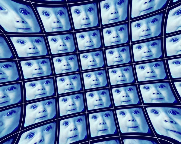 Distorted blue video screens showing the face of a baby — Stock Photo, Image
