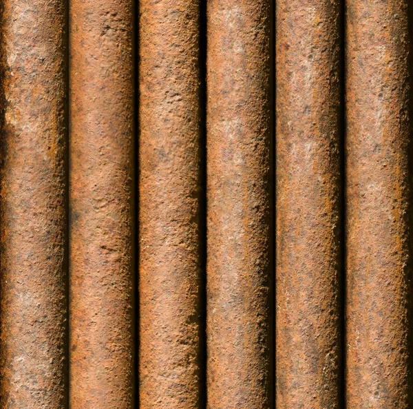 Vertikale rostige Rohr Hintergrund nahtlos kachelbar — Stockfoto