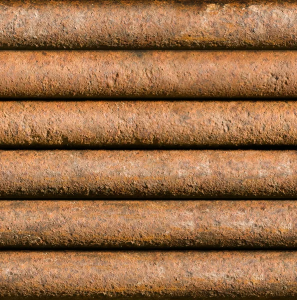 Horizontal rusty pipe background seamlessly tileable — Stock Photo, Image