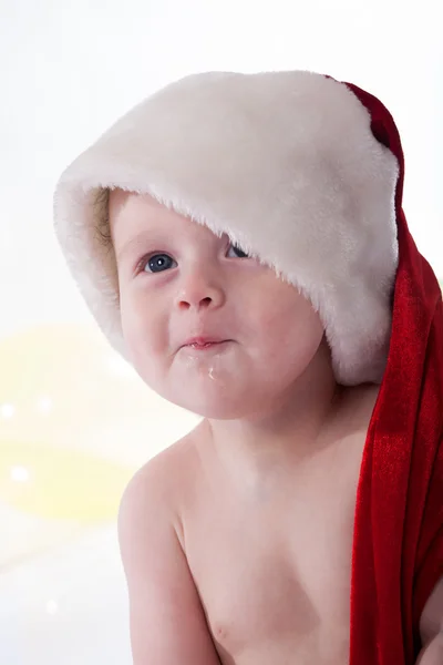 Дитина в капелюсі Санта — стокове фото