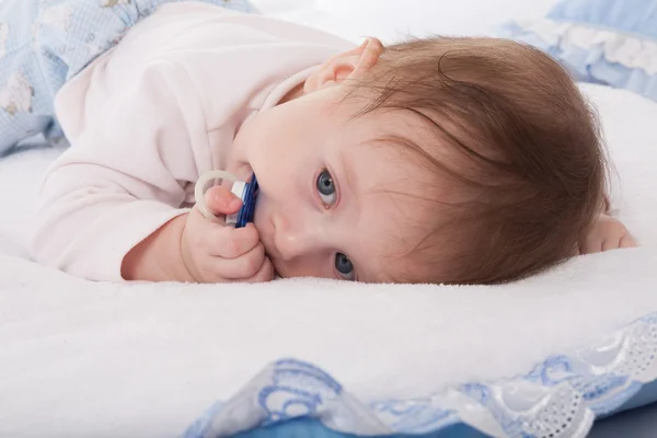 Little boy with a pacifier — Stock Photo, Image