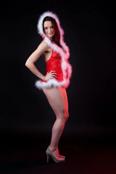 Sexy young girl in lingerie styled Santa suit Stock Image