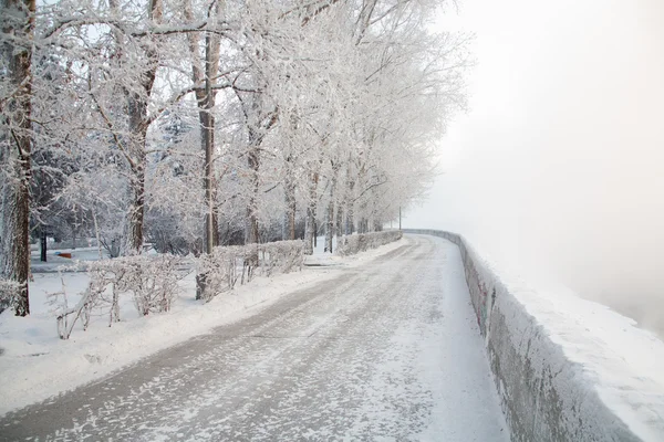 Snow-covered desolate alley — Stock Photo, Image