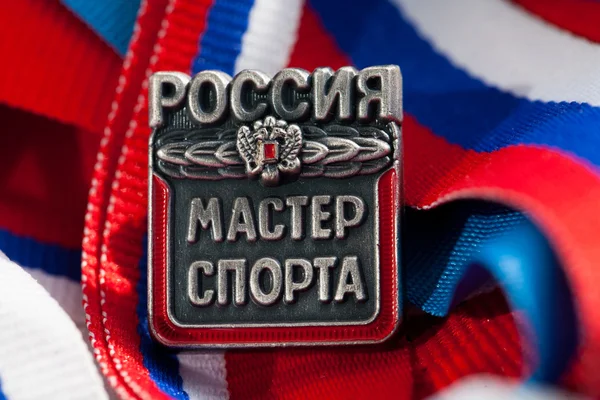 Master of Sports of Russia sign the athlete against the Russian flag