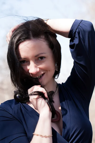 Portrait of a model in an evening dress with a neckline — Stock Photo, Image