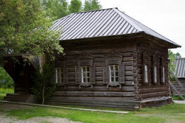 Russian nineteenth-century timbered log hut clipart