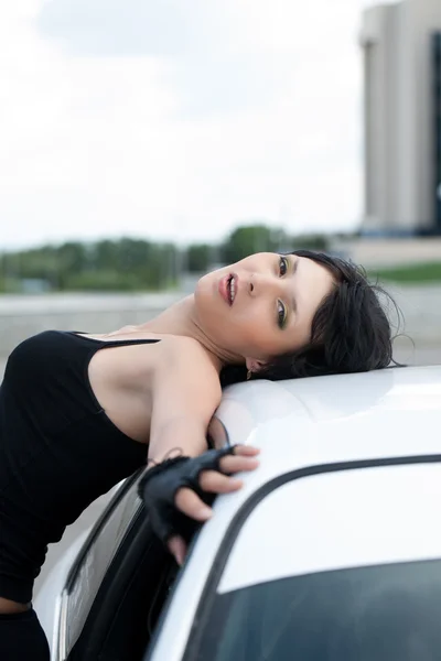 Portrait of a girl with a car — Stock Photo, Image