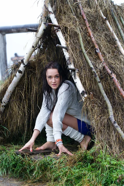 Girl hiding from the rain in a tent — Stock Photo, Image