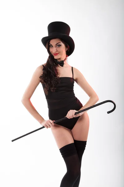 Woman in top hat with a cane — Stock Photo, Image