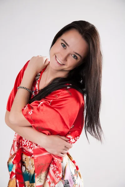 Retrato de una hermosa joven en un kaftan brillante —  Fotos de Stock