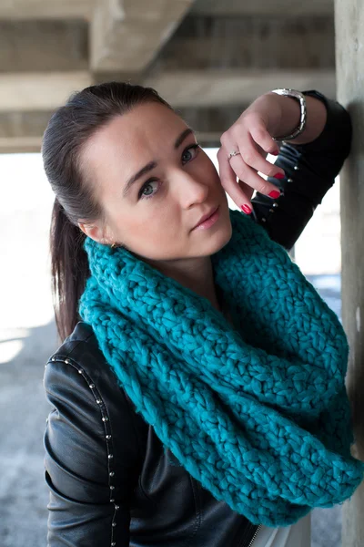 Girl in leather jacket with scarf — Stock Photo, Image
