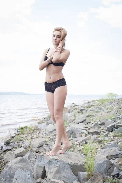 Girl in lingerie on the bay — Stock Photo, Image