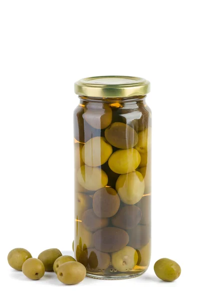 Glass jar with green and black olives . Some near — Stock Photo, Image