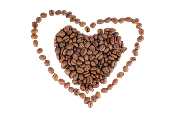 白い背景で隔離のコーヒー豆から作られた心 — ストック写真