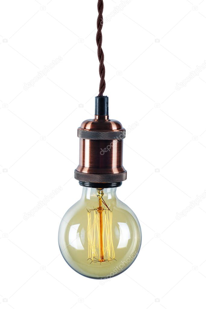Glowing vintage light bulb isolated on white background