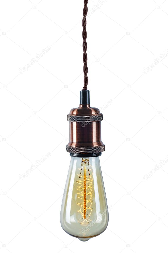 Glowing vintage light bulb isolated on white background