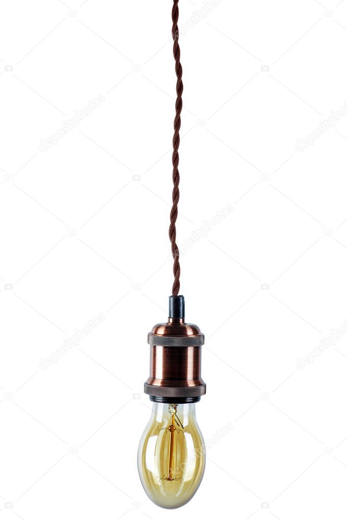 Glowing vintage light bulb isolated on white background