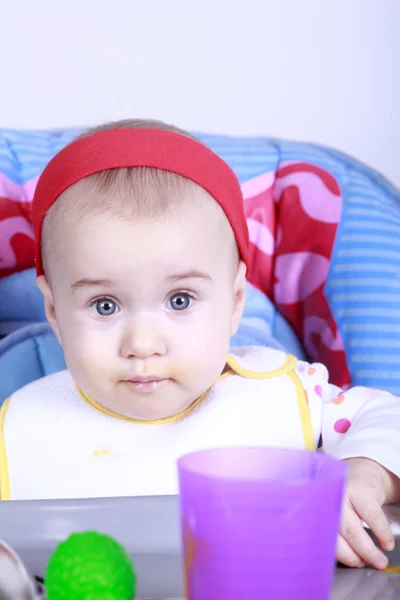 Baby girl eating lunch — Stock Photo, Image