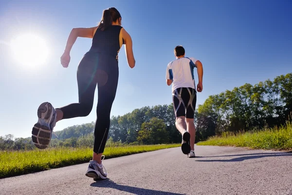 Mladý pár, jogging — Stock fotografie