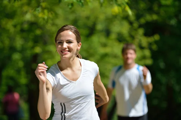 Fiatal pár, jogging — Stock Fotó