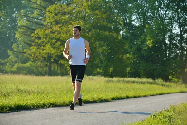 Mladý pár jogging na ráno — Stock fotografie