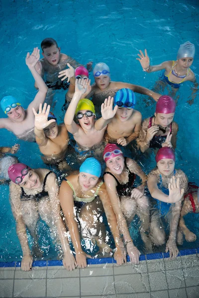 Happy childrens at swimming pool — Stock Photo, Image