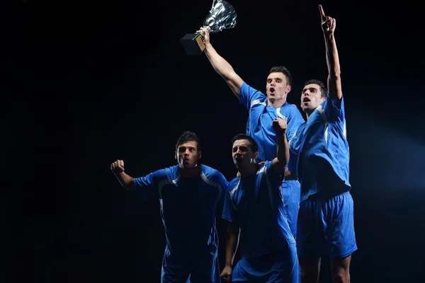 Soccer players celebrating victory — Stock Photo, Image