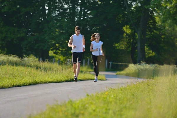 Casal jogging — Fotografia de Stock