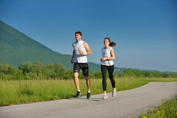 Casal jogging — Fotografia de Stock